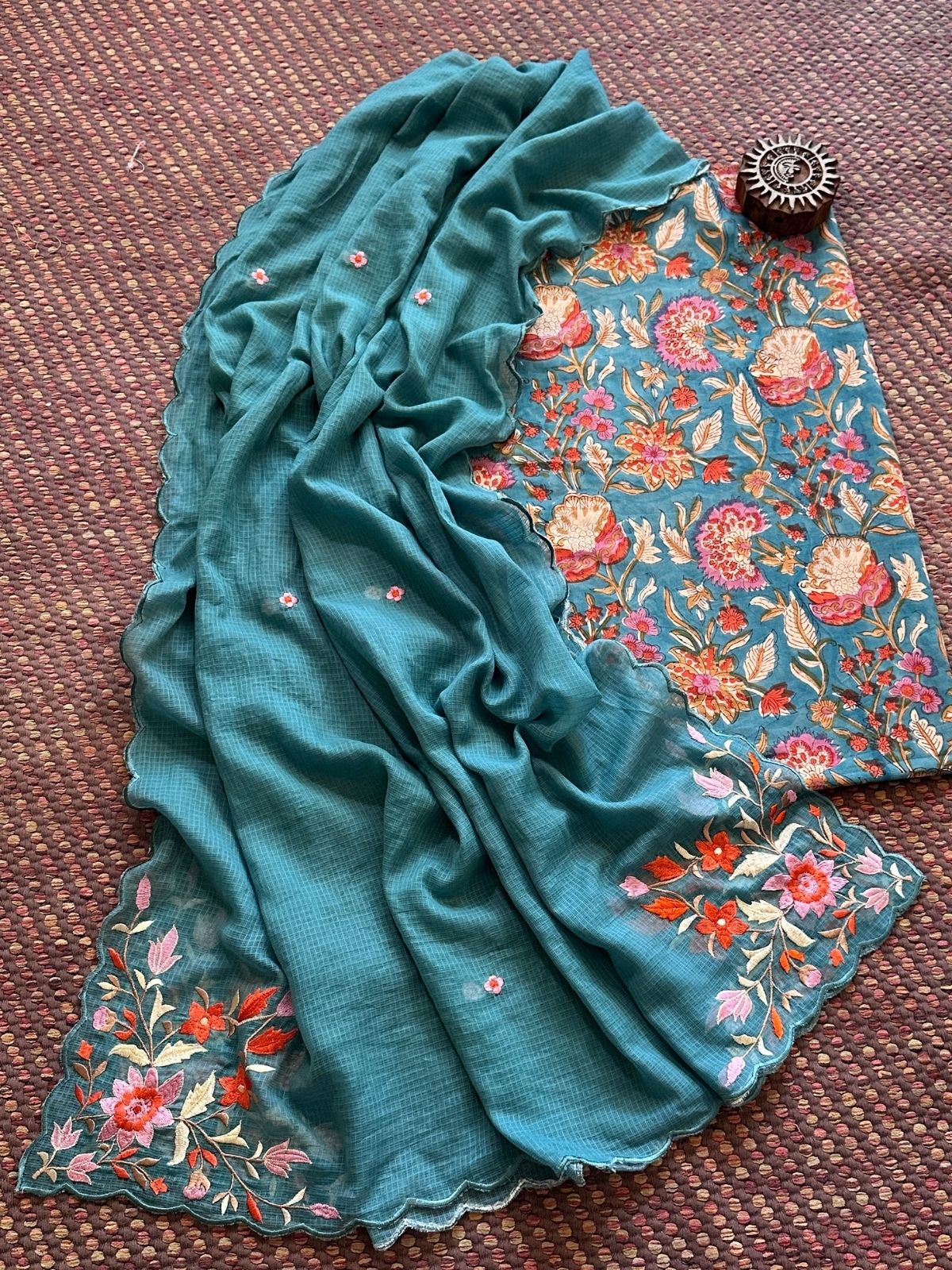 Pure Cotton Hand blocked fabric paired with a embroidered kota doria dupatta.