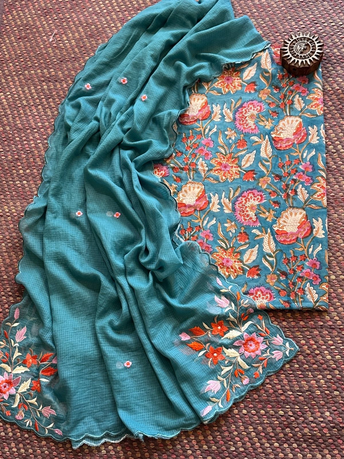 Pure Cotton Hand blocked fabric paired with a embroidered kota doria dupatta.